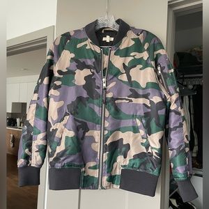 Black, purple, and green camouflage bomber